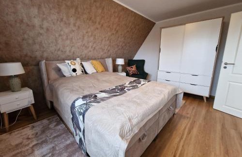 Albertsdorf Apartment | Haus-Fehmarn-am-Dorfteich-|-Wohnung-1-Sued