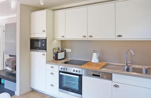 Suddorf House | Haus Strandweg 8 Friesenhaushälfte *Steuerbord*