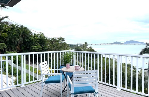 Kaneohe House | Hawaiian Hillside Retreat with panoramic Kaneohe Bay and Mountain views