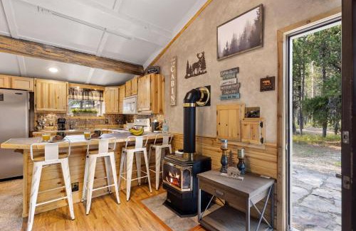 Island Park House | Hayloft Hollow by KABINO Fire Pit Fireplace Loft with Low Ceiling High Chair WiFi