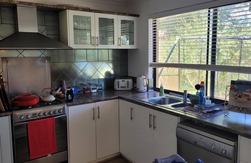 Halls Head House | Heated pool, spacious home, centrally located, walk to beach - Sleeps 10