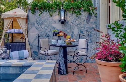 Historic Downtown Savannah House | Heated Private Garden Pool Steps Off Jones Street by Lucky Savannah