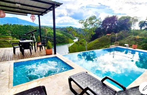 Guatape House | Hermosa habitación 203 deluxe GC