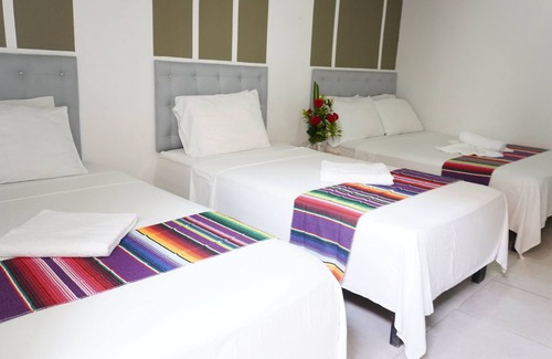 Sucre Hotel | Hermosa Habitación Estándar Familiar A Pie De Playa