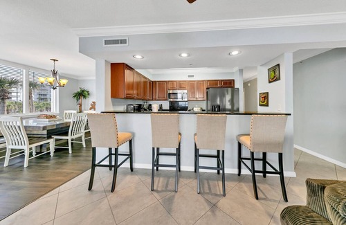 Fort Walton Beach Condo | Heron 303-HUGE CORNER CONDO w/Wrap Around Balcony overlooking Lazy River & Bay!