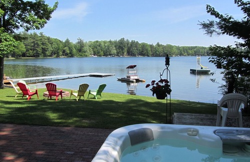 Interlochen Cottage | Hidden Gem Cottage on Bass Lake with Hot Tub - Summer Memories Last Forever