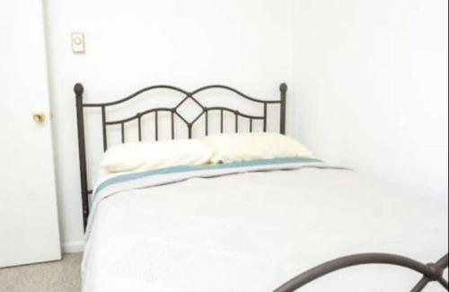 North Beach House | Hideaway By The Bay - Sunroom, bay view, propane fire pit, 6ft tall wood fence