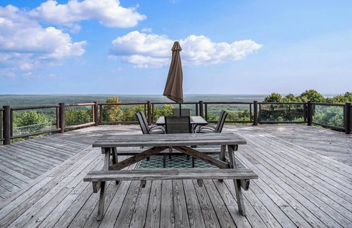 Alanson House | High In The Tress Overlooking Multiple Lakes