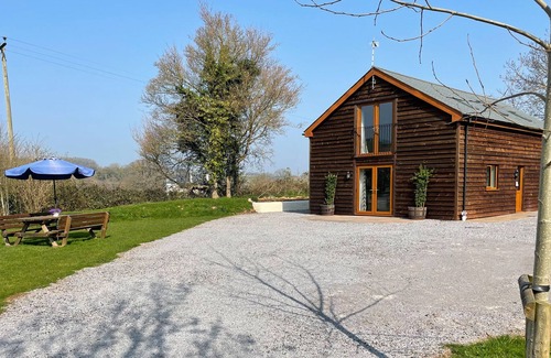Old Cleeve House | HIGH LODGE, pet friendly, with a garden in Washford
