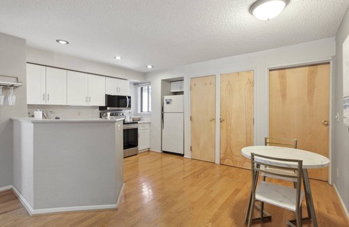 Speer Condo | Hip Historic Baker Area Condo - Individual Garage Parking Included!