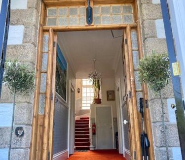Portreath Apartment | Historic Bassets acre, 4 min walk to Beach, Pubs,Restaurants, Shops, Htd Pool, Stunning walks, Hottub, Games rm, Garden, BBQ, Just 6 beautiful 1-3 bdr Apartments, Enjoy being one of the few! Free Parking and WIFI