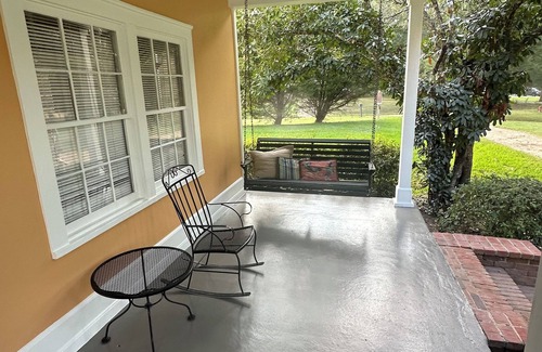Natchez Cottage | Historic cottage privately situated on the grounds of the Foster Mounds.