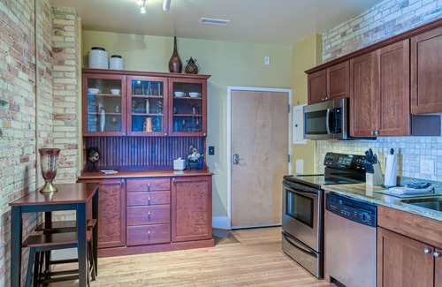Traverse City Condo | Historic Top Floor Condo at the Grand Traverse Commons