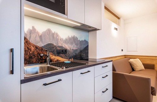 Funes Other | Holiday Apartment "Planerhof Apartment Alpenrose" with Mountain View, Shared Terrace, and Wi-Fi