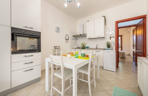 Villasimius House | Holiday Home "Casa Clà" with Mountain View, Garden and Air Conditioning