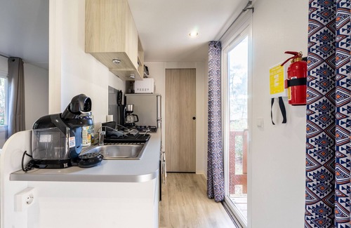 Les Mathes House | Holiday Home 'Mobil Home La Palmyre' with Shared Pool and Private Terrace