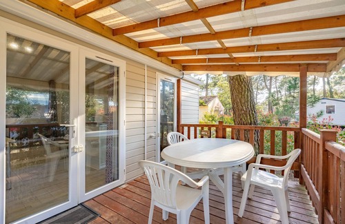 Les Mathes House | Holiday Home 'Mobil Home La Palmyre' with Shared Pool and Private Terrace