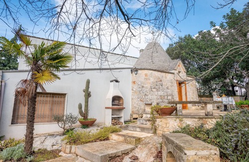 Ostuni House | Holiday Home "Trullo Nova - Ostuni" with Garden & A/C