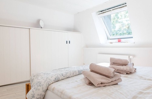 Langballigholz Other | Holiday house with sea view and sauna, fireplace & winter garden located directly on the forest