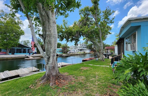 Weeki Wachee Gardens House | Home on canal near Rogers Park, 2 docks, water access to the Gulf, sleeps 10