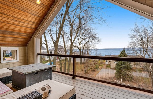 Malletts Bay House | Home on Lake Champlain with pool, hot tub, in-home gym, firepit, & lovely views
