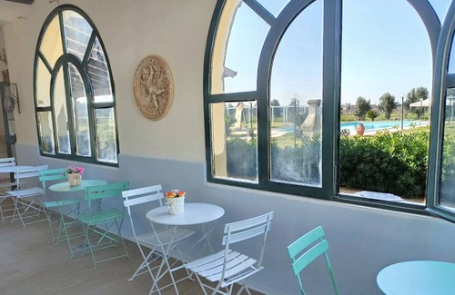 Lizzano House | Homerez - Charming Bungalow in Lizzano with Shared Pool