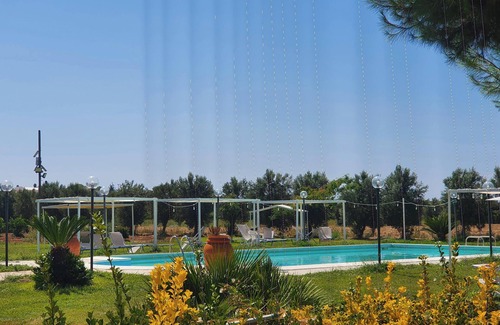 Lizzano House | Homerez - Charming Bungalow in Lizzano with Shared Pool