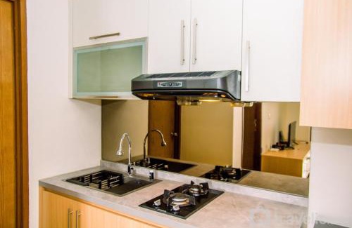 Panunggangan Utara Apartment | Homey and Serene 2BR at Great Western Resort Apartment By Travelio