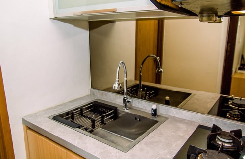 Panunggangan Utara Apartment | Homey And Serene 2Br At Great Western Resort Apartment