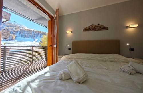 Sestriere Apartment | Hostdomus - Suite Les Etoiles