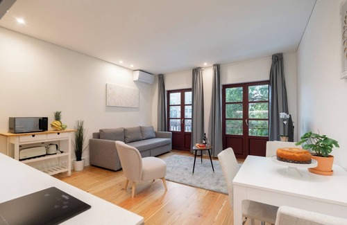 Guimaraes Apartment | HostWise - Modern Comfort in City Center