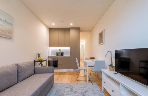 Guimaraes Apartment | HostWise - Sunny Flats w/Balcony