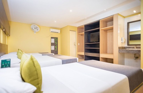 Metropolitana Hotel | Hotel 56 Avenue Plaza