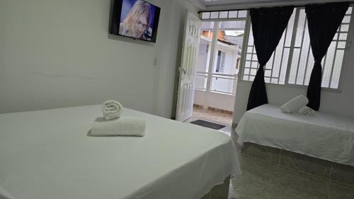 Sevilla Hotel | Hotel Valle del Café - Habitación 8 Grupo 2 Camas