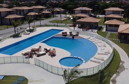 Manguinhos House | House 4 suites excellent finishing in condominium.