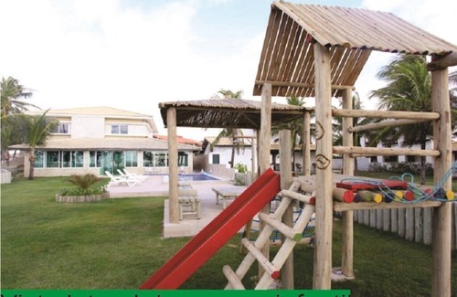 Itacimirim House | House in Guarajuba, foot in the sand, with eight suites.