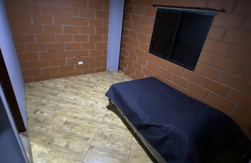 Cocorna Other | House located in between a canyon in the mountains of Antioquia.