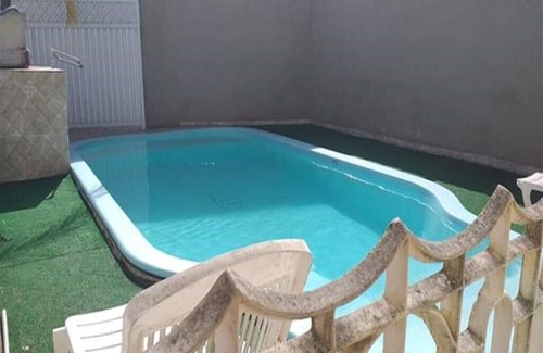 Jardim Camburi House | House with pool, garage, internet and Wi-Fi