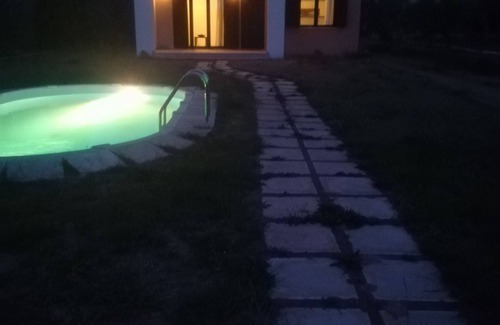 Eretria House | House with pool, garden and fireplace