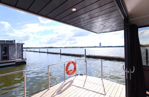 Schleswig Boat Rental | Houseboat Fjord Aries with roof terrace in Schleswig