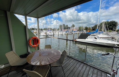 Schleswig Boat Rental | Houseboat Walfisch for 5 pers, with roof terrace in Schleswig