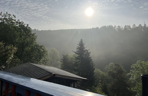 Hatzfeld House | How in heaven, colorful house on a hill with stunning views of the Ederta