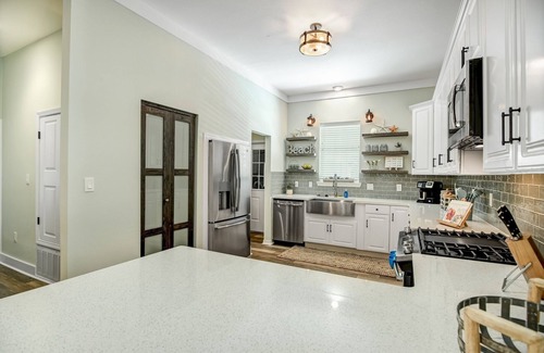 Sugarwood Beach House | Huge heated pool Close to beach and Seaside, 6 seat Gem car