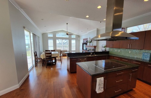 Tarpon Springs House | Huge Riverfront Home! Heated pool, Jacuzzi, and Kayaks Included!