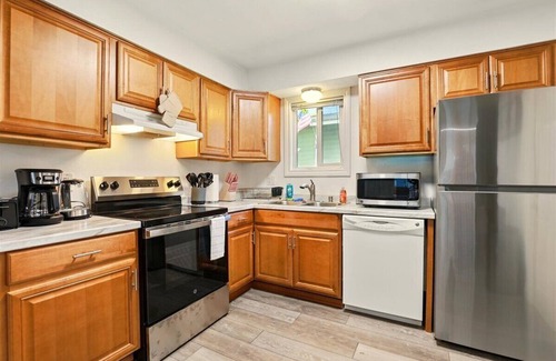 University Area House | Hugs In The Dusk - 2 Beds 1 Bath unit—one side of a duplex in Midtown Anchorage.
