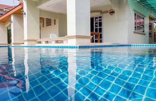 Na Kluea Villa | I-Rin poolvilla featuring its own swimming pool set in a private estate.