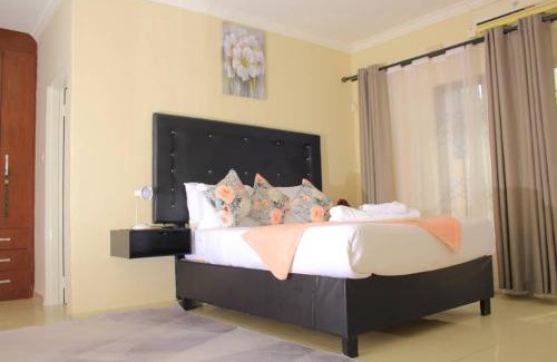 Gaborone Bed & Breakfast | Ideal Ensuite Bedroom For Couples By Airport Junction Mall with Netflix & Youtube
