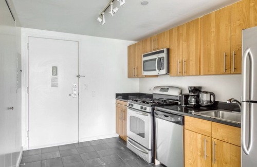 Hunters Point Apartment | Ideal LIC 1BR w/W/D, Elevator & Doorman, near East River, by Blueground