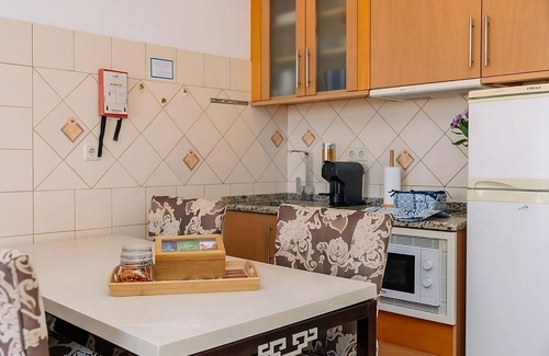 Oura Hotel | Ideal Mix of Comfort & Value! Four Family Suites, Kitchenettes, Private Balcony!