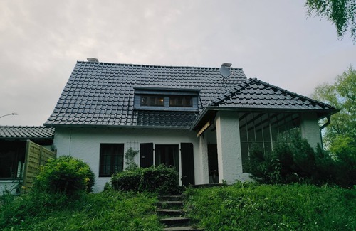 Kronenburg House | Idyllic holiday home in the countryside with terrace and winter garden
